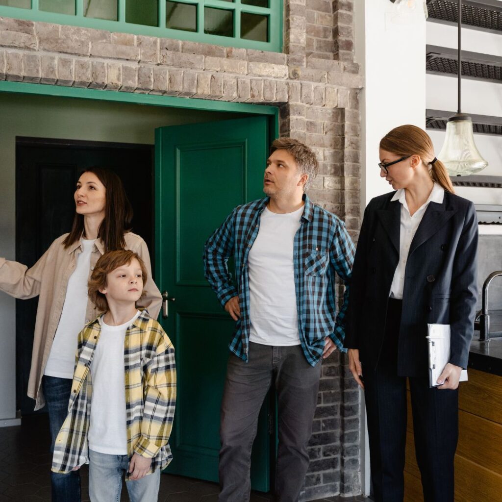 realtor showing a house