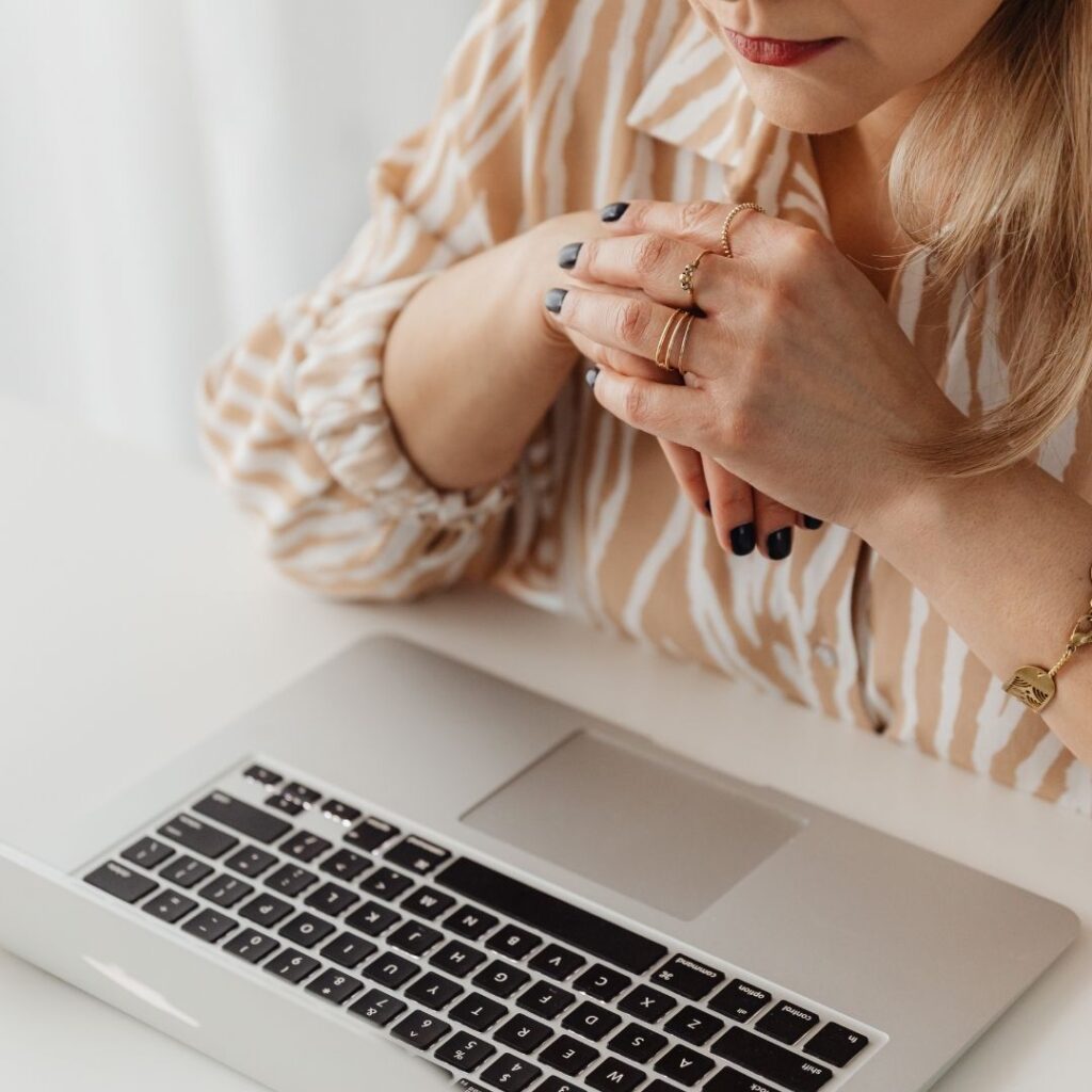 woman researching on laptop